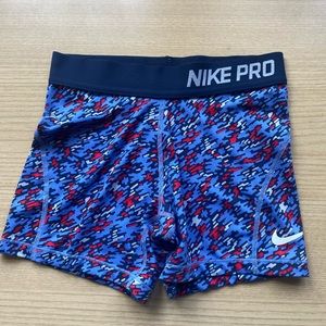 Girls Medium Nike Pro red and blue Spandex Shorts